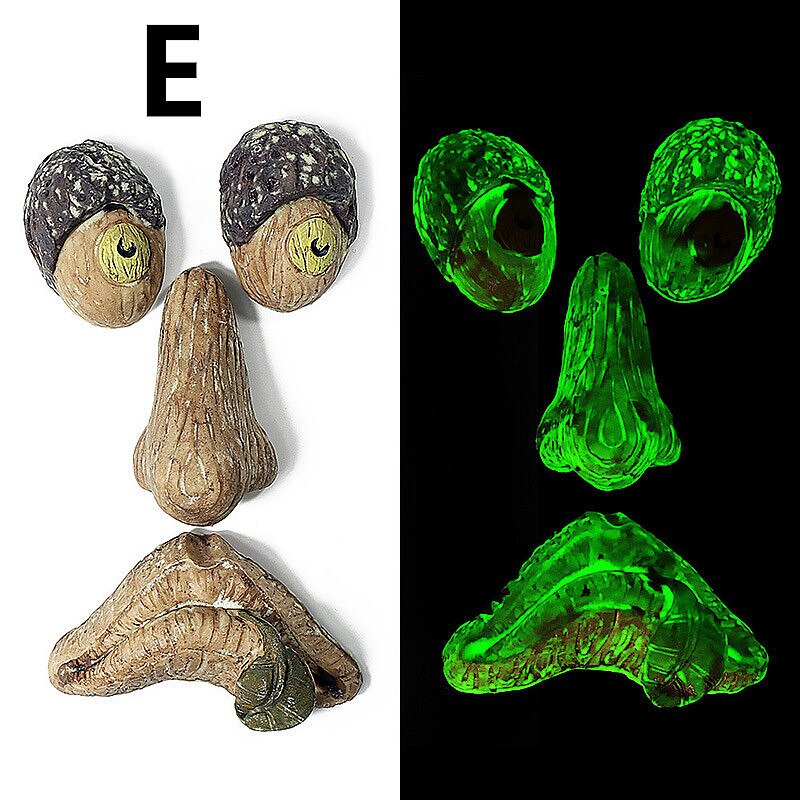 Gartenkunst, amüsante Skulptur mit altem Manngesicht, skurrile Baumgesicht